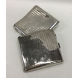 Two heavy silver engine turned cigarette boxes. Ap