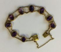 An attractive amethyst bracelet with concealed cla