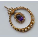 A 15 carat amethyst and pearl drop pendant with lo