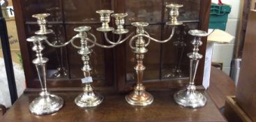 Plated candlesticks and candelabra.