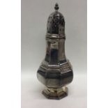 A heavy silver baluster shaped sugar caster. Londo