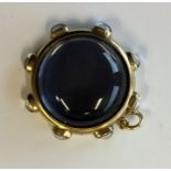 A massive circular crystal locket pendant with loo