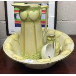 A stylish pottery jug and basin set.