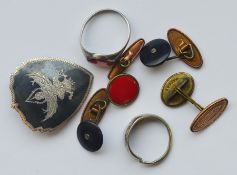 A collection of silver and other brooches and cuff