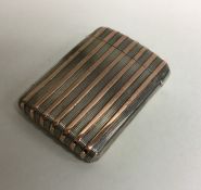 A massive silver and gold inlaid vesta case with h
