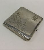 A Russian engraved silver cigarette box. Punched t