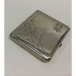 A Russian engraved silver cigarette box. Punched t