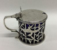 An attractive Victorian silver mustard decorated w