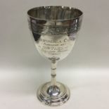 An attractive silver engraved tapering goblet. Bir