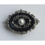 A good agate diamond and pearl brooch of oval desi