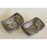 An attractive pair of small bead edge baskets with