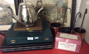 Plated cutlery sets and copper measures.