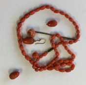 A quantity of good coral beads and pendants. Appro