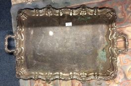 An old Sheffield plated tray with shell border.