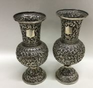 A good pair of Indian silver spill vases attractiv