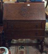 An oak fall front bureau.