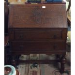 An oak fall front bureau.