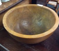 An old carved wooden bowl.