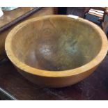 An old carved wooden bowl.