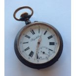 A gent's gun metal pocket watch with white enamel