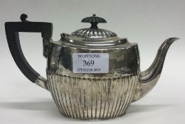 A small silver bachelors teapot. Approx. 244 grams