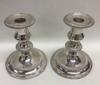 A good pair of silver plated candlesticks with gad