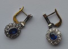 A pair of attractive French platinum earrings. App