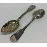 A pair of silver fiddle and thread berry spoons wi
