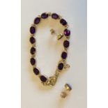 A gold and amethyst bracelet together with matchin