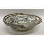 An 18th Century silver swing handled basket with b