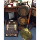 An old cake stand, coal box and warming pan.