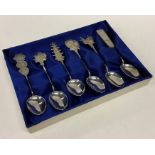 A set of six silver Chinese coffee spoons containe