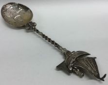 A Dutch spoon with windmill decoration. Approx. 65