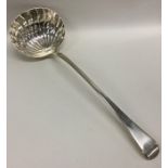 A heavy silver OE ladle with shell bowl. Approx. 2