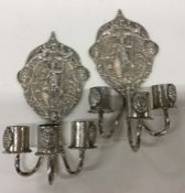 A good pair of Dutch silver wall sconces embossed