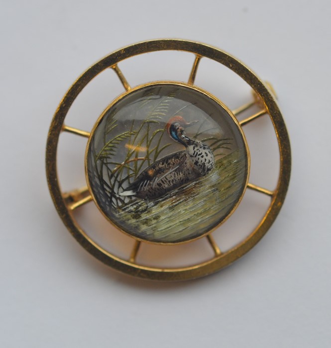 A good circular Essex crystal brooch in the form o