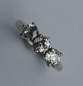 A good diamond three stone ring in platinum claw m