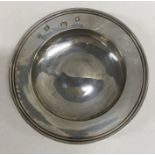 A small silver armada dish with reeded border. App
