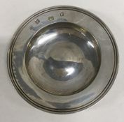 A small silver armada dish with reeded border. App