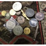A collection of old silver and other coins.