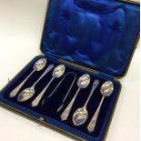 A good boxed set of six silver spoons and sugar to