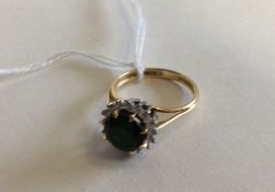 A diamond and tourmaline cluster ring in two colou