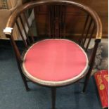 An inlaid bow back chair.