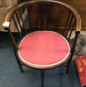 An inlaid bow back chair.