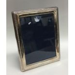 A large modern rectangular silver picture frame. L