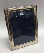 A large modern rectangular silver picture frame. L