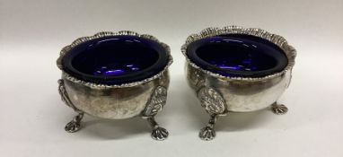 A pair of Irish salts with gadroon rims and blue g