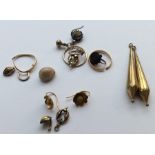 A group of wedding bands, gold mounted earrings et