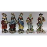 A group of five German porcelain figures of ladies