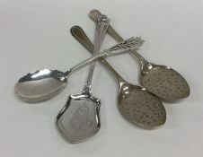 A pair of bright cut preserve spoons together with